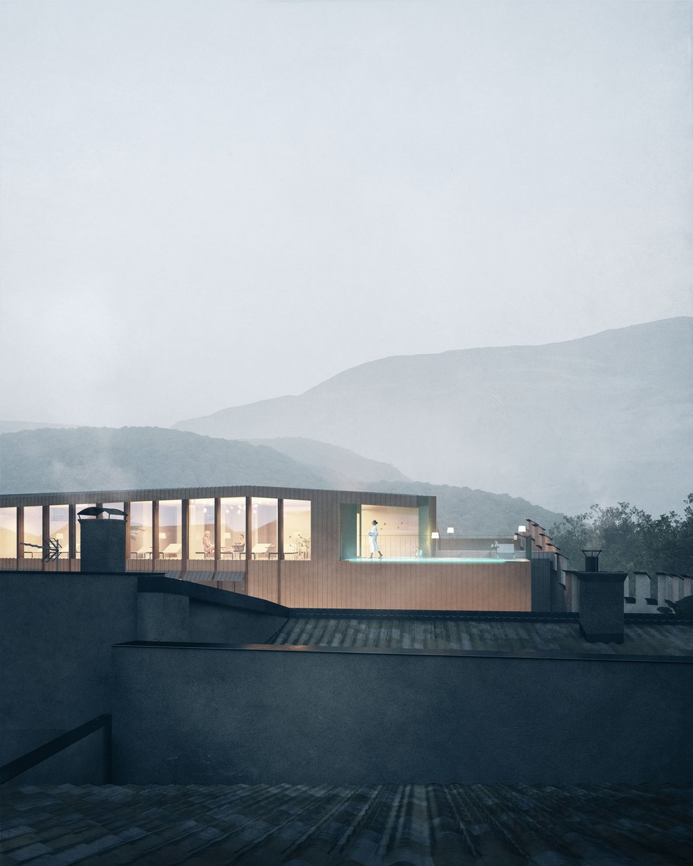 Modern building with large windows and lit interior at night